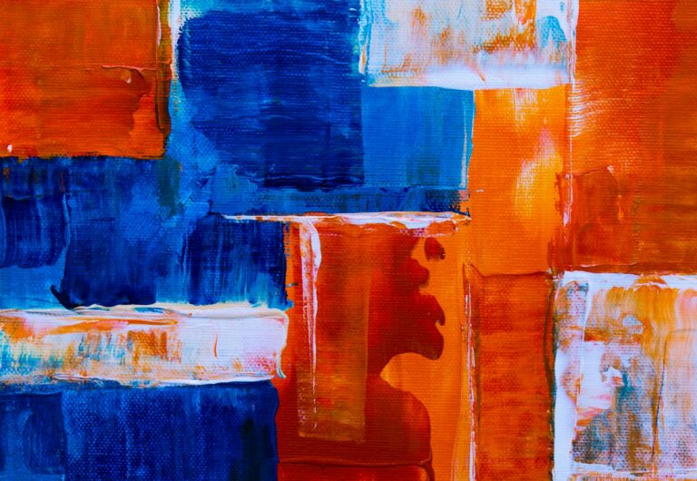 Colorful abstract expressionist painting with blue and orange acrylics on canvas.